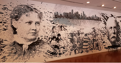 Mural at HistoryMiami Museum depicting historical figures including Julia Tuttle and Henry Flagler